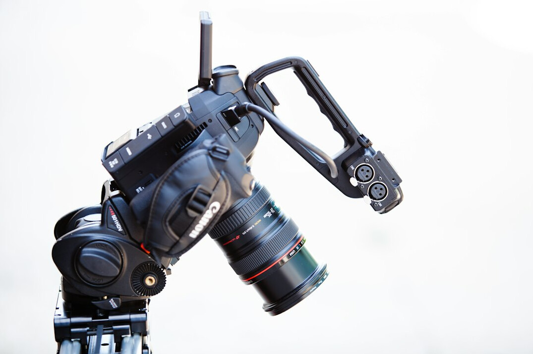 Professional broadcast camera rig with lens and shoulder mount